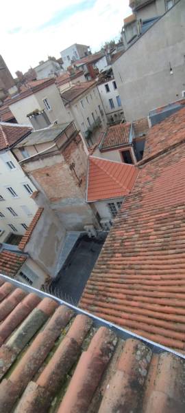 Rénovation de toiture en tuiles et zinguerie traditionnelle à Toulouse centre